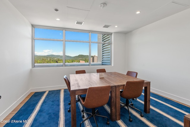 dining space with a mountain view