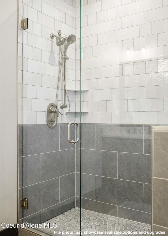 bathroom featuring an enclosed shower