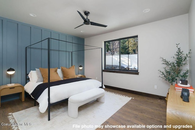 bedroom featuring dark wood-type flooring and ceiling fan