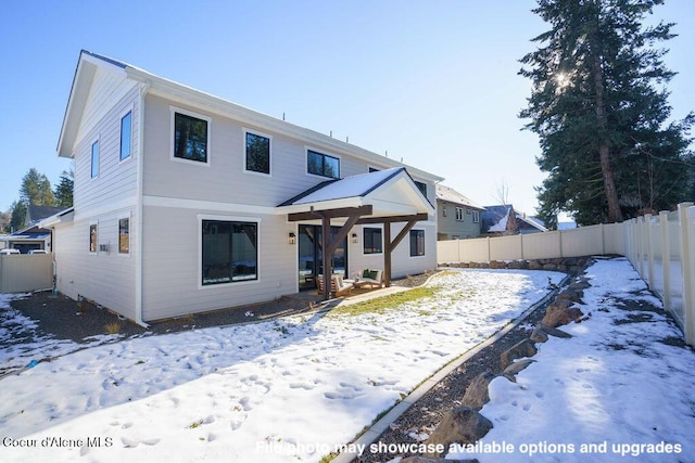 view of snow covered property