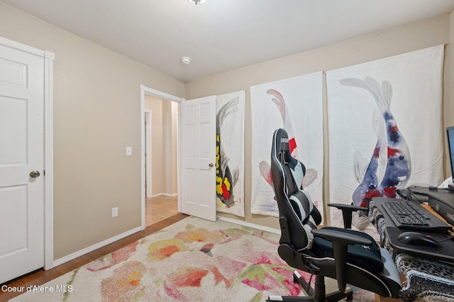 office space with hardwood / wood-style flooring