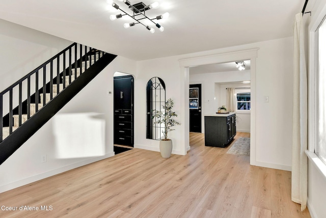 entrance foyer with light wood-type flooring