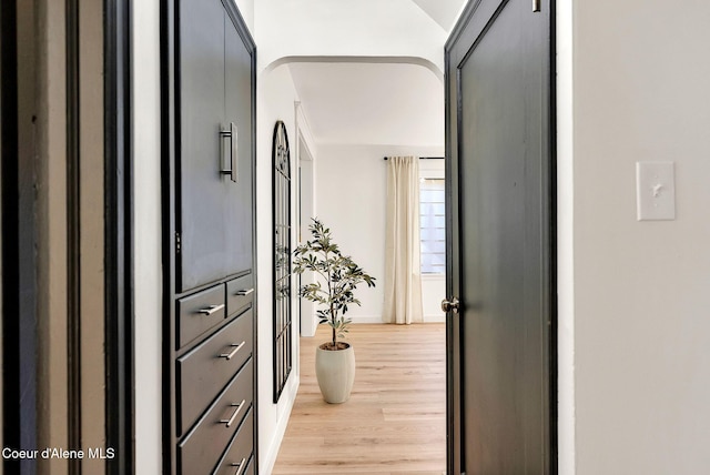 hall with light hardwood / wood-style floors