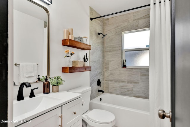 full bathroom featuring vanity, toilet, and shower / bath combo with shower curtain