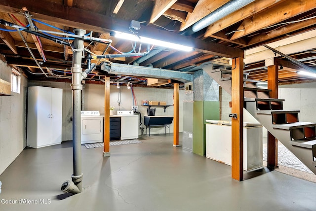 basement featuring washer and dryer