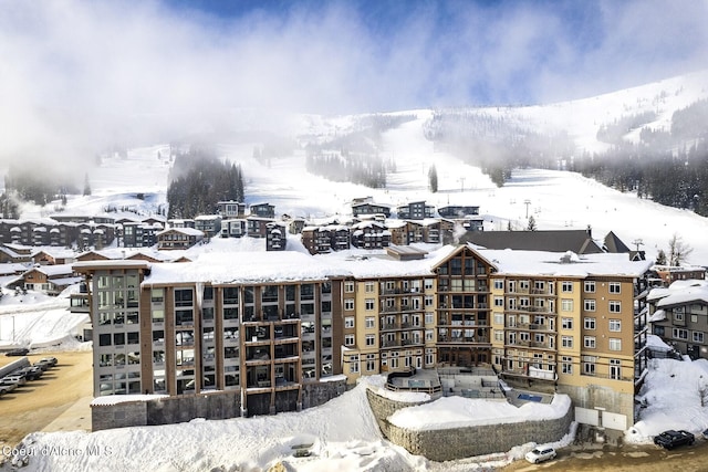 view of snow covered property