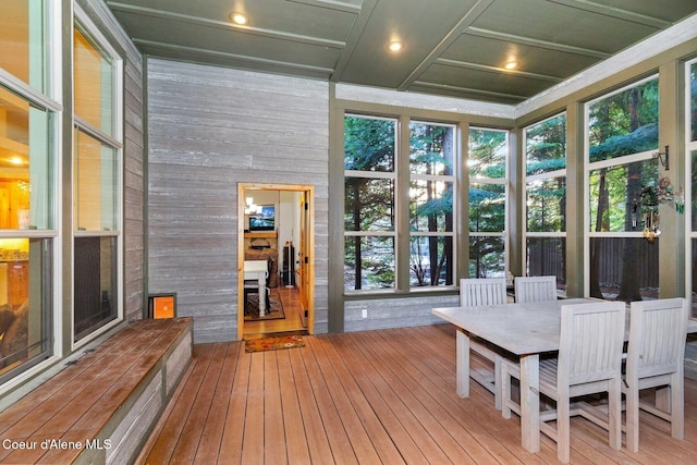 unfurnished sunroom featuring coffered ceiling