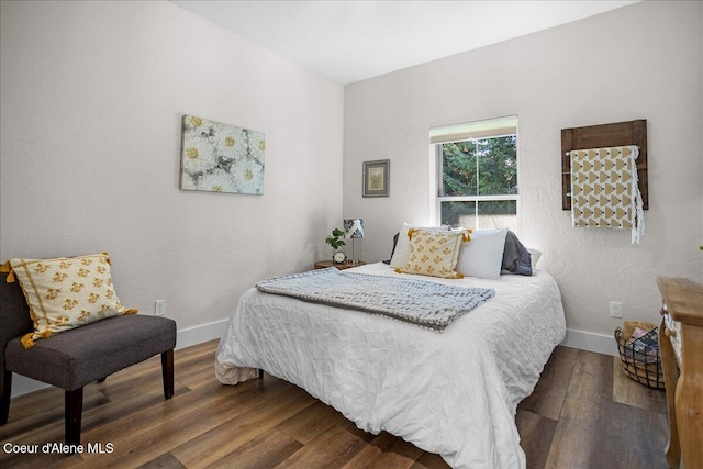 bedroom featuring wood-type flooring