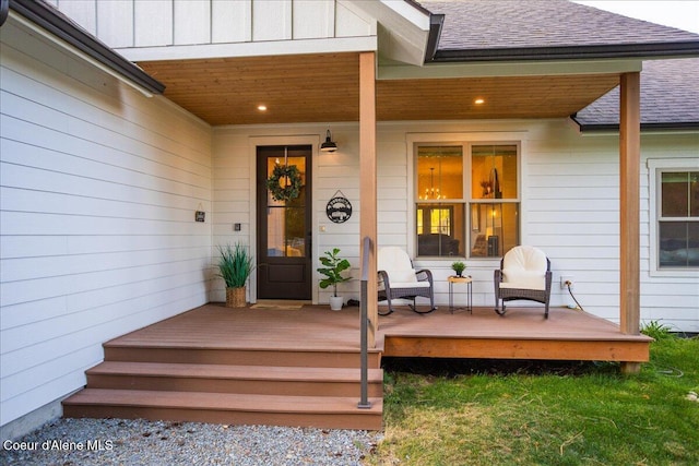 entrance to property with a deck