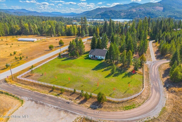 birds eye view of property featuring a mountain view and a rural view