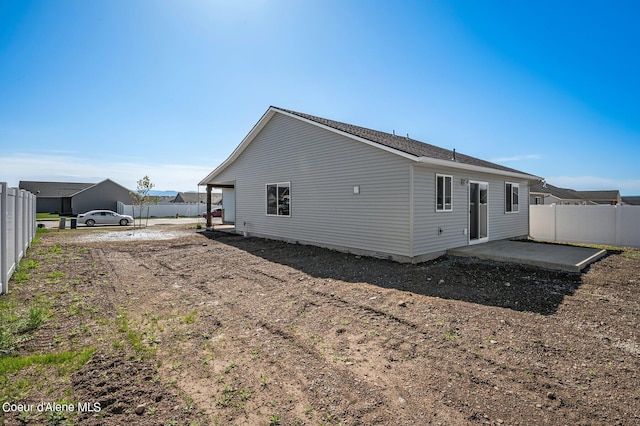 rear view of property with a patio area