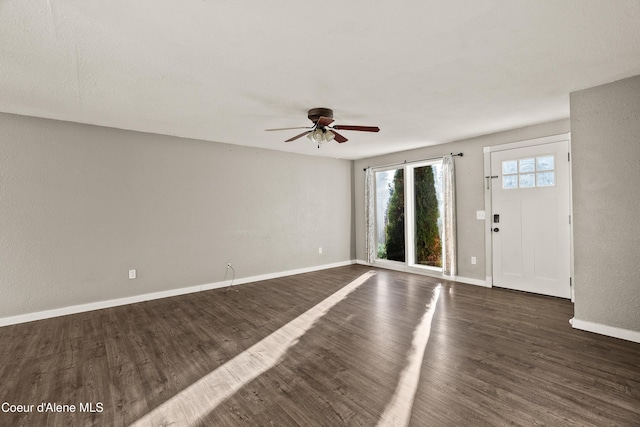 interior space featuring dark hardwood / wood-style floors and ceiling fan