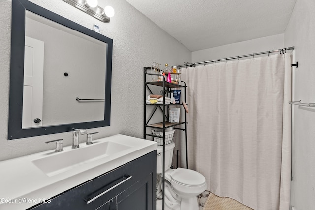 bathroom with vanity, a shower with shower curtain, a textured ceiling, and toilet