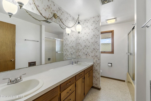 full bathroom with enclosed tub / shower combo, vanity, and toilet