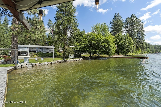 view of dock with a water view