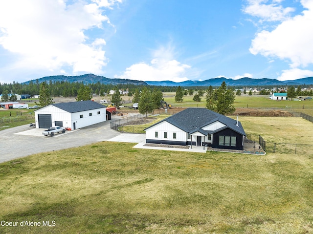 drone / aerial view featuring a mountain view