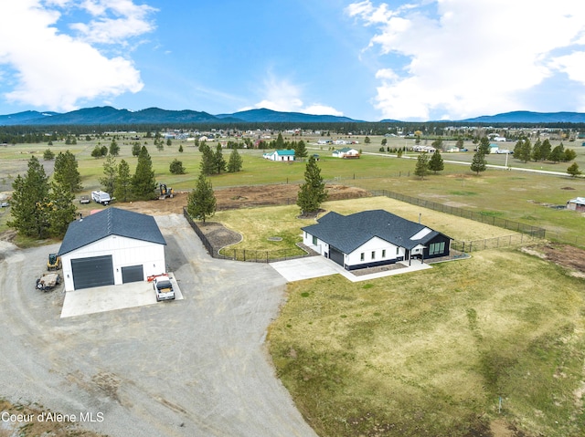 bird's eye view featuring a mountain view and a rural view