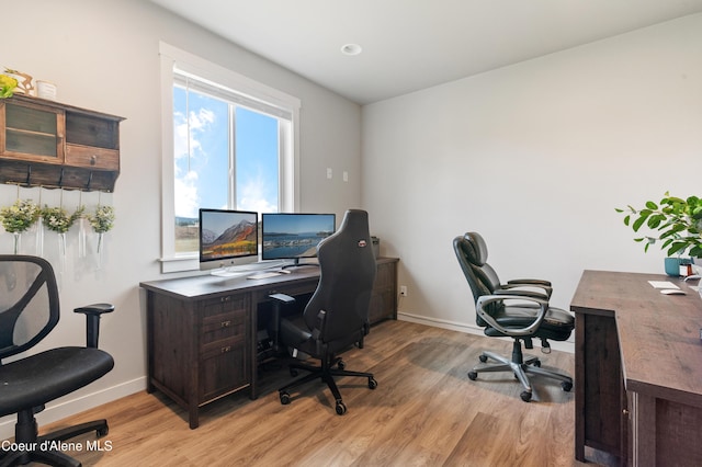 home office featuring light hardwood / wood-style flooring