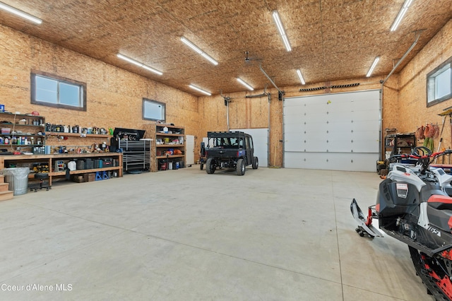 garage featuring a workshop area