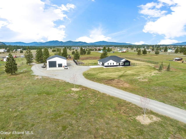 exterior space featuring a rural view and a mountain view