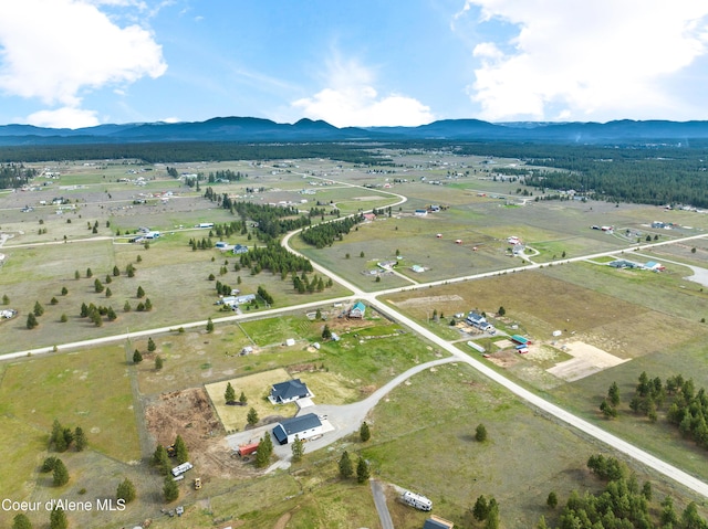 aerial view with a rural view and a mountain view