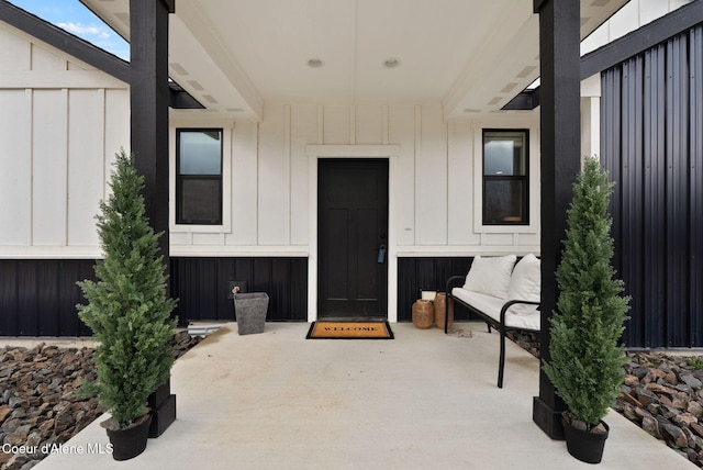 property entrance with board and batten siding