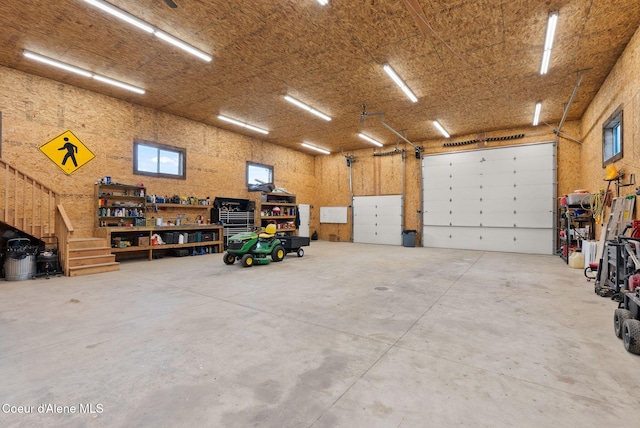 garage with a workshop area