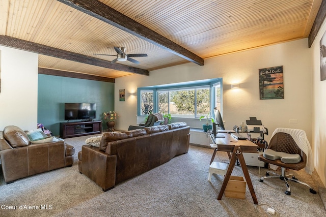 living room with beamed ceiling, carpet, wood ceiling, and ceiling fan