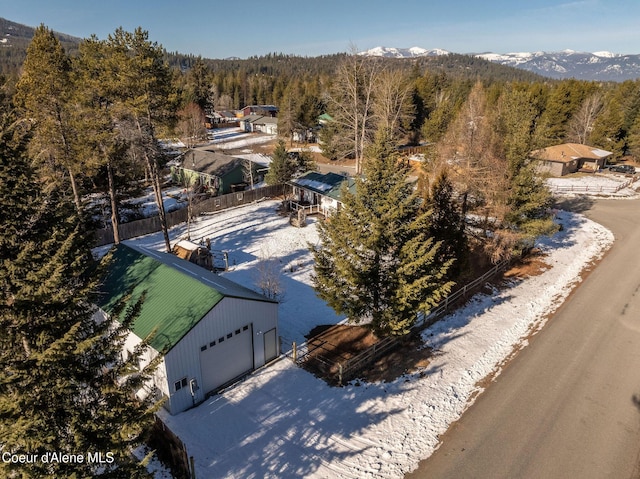 birds eye view of property featuring a mountain view