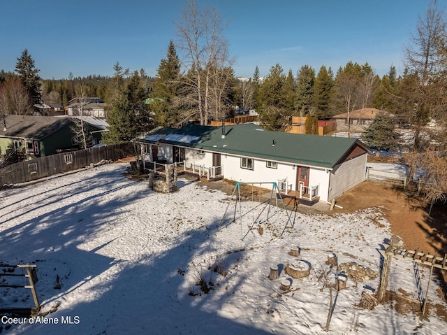 view of snow covered property