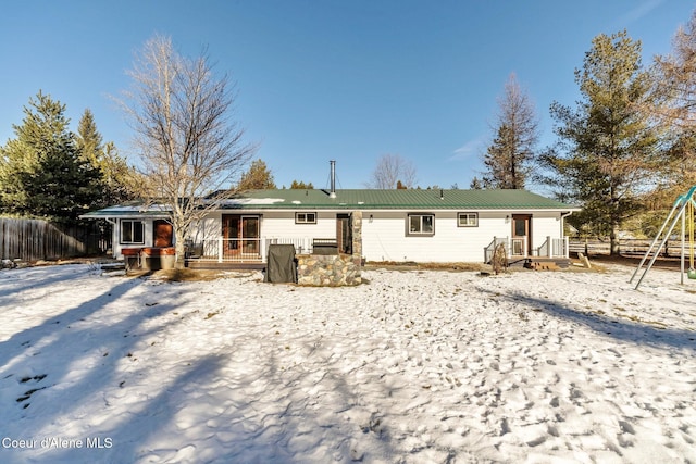 view of snow covered house