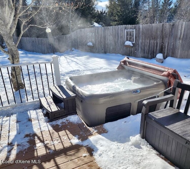 exterior space featuring a hot tub