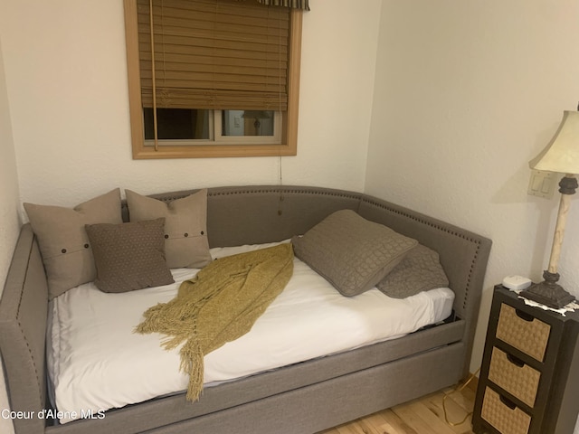 bedroom with light hardwood / wood-style flooring