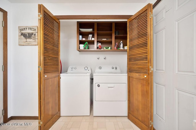 clothes washing area with independent washer and dryer