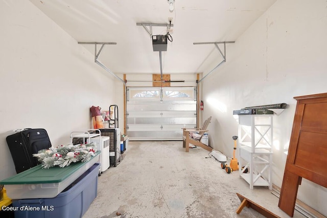 garage featuring a garage door opener