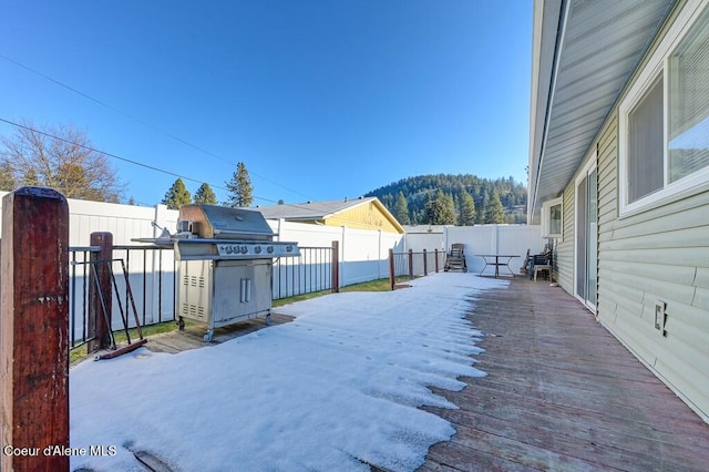 wooden terrace featuring a mountain view