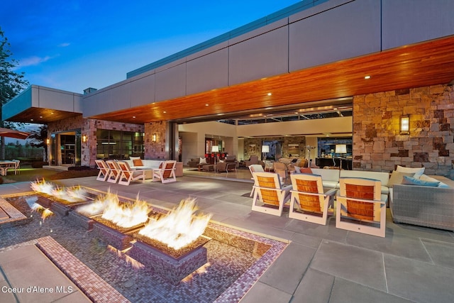 exterior space with an outdoor fire pit