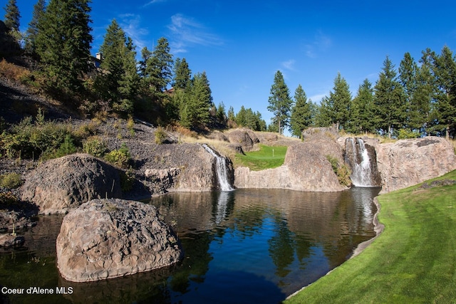 view of property's community with a water view