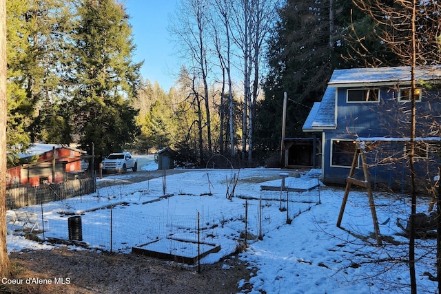 view of yard covered in snow