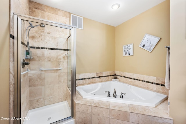 bathroom with independent shower and bath