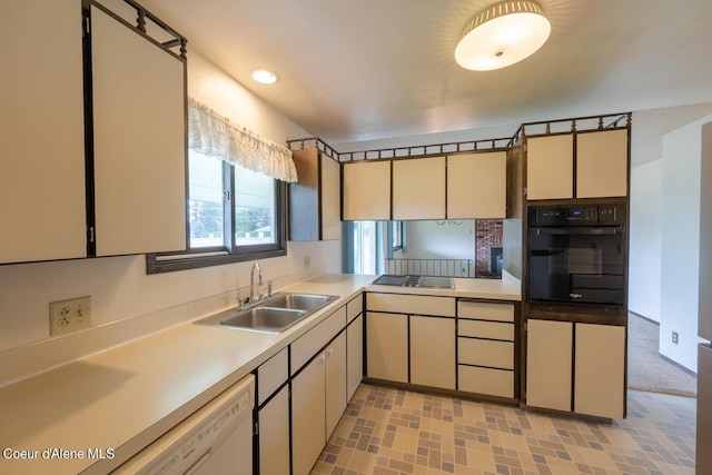 kitchen featuring sink and black appliances