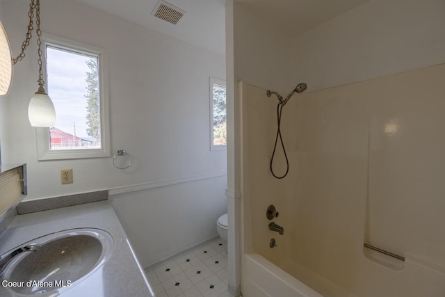 full bathroom with  shower combination, toilet, and vanity