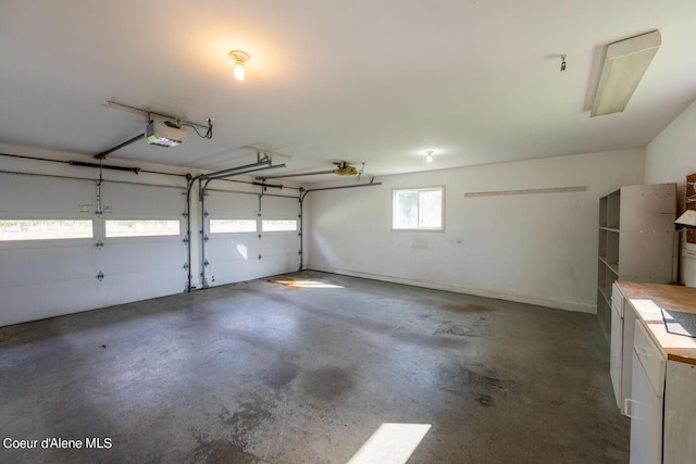 garage featuring a garage door opener