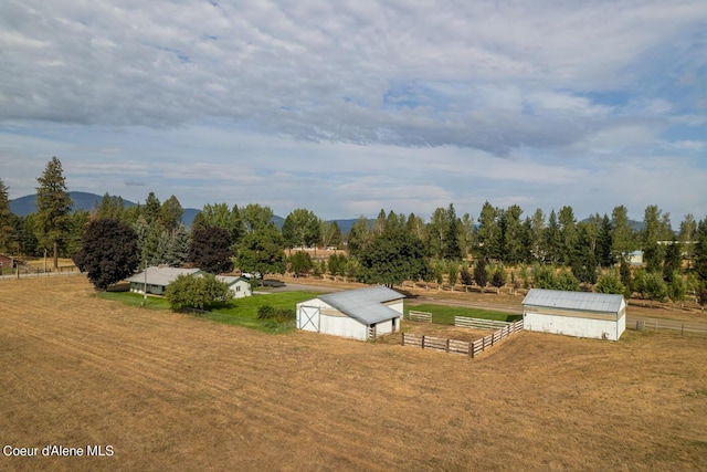 birds eye view of property featuring a rural view