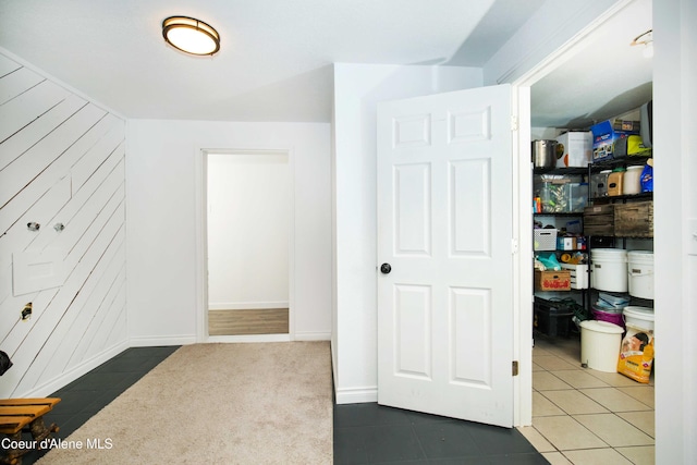 interior space featuring dark tile patterned floors