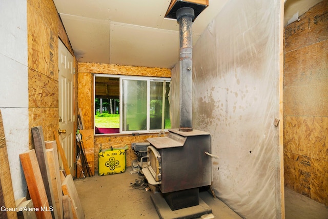 misc room featuring a wood stove