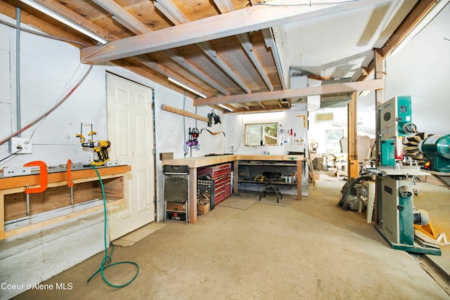 basement with a workshop area