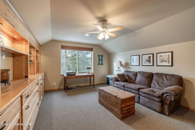 living room with lofted ceiling, carpet floors, and ceiling fan