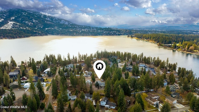 aerial view with a water and mountain view