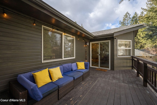 wooden terrace featuring outdoor lounge area